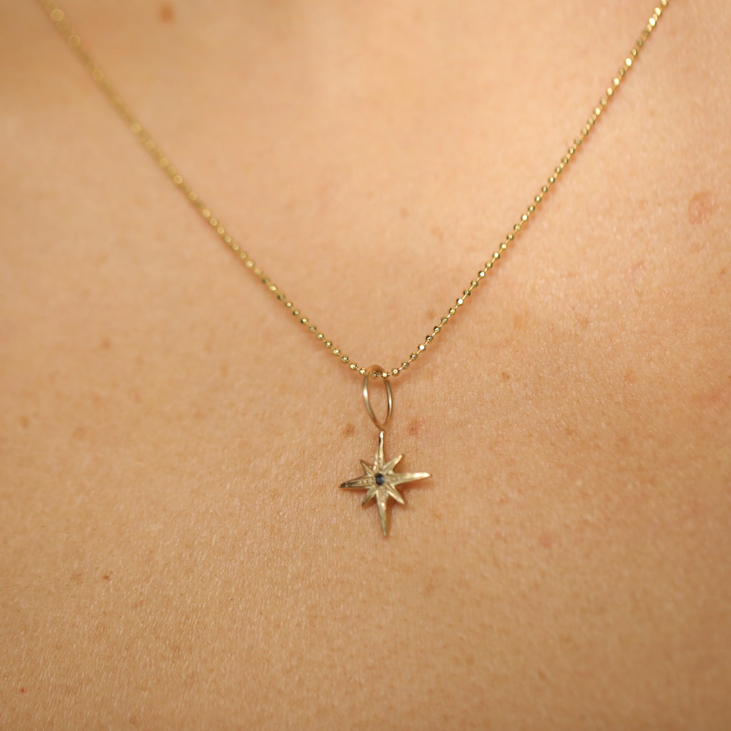 Mara-Scalise-north-star-pendant-black-diamond-gold