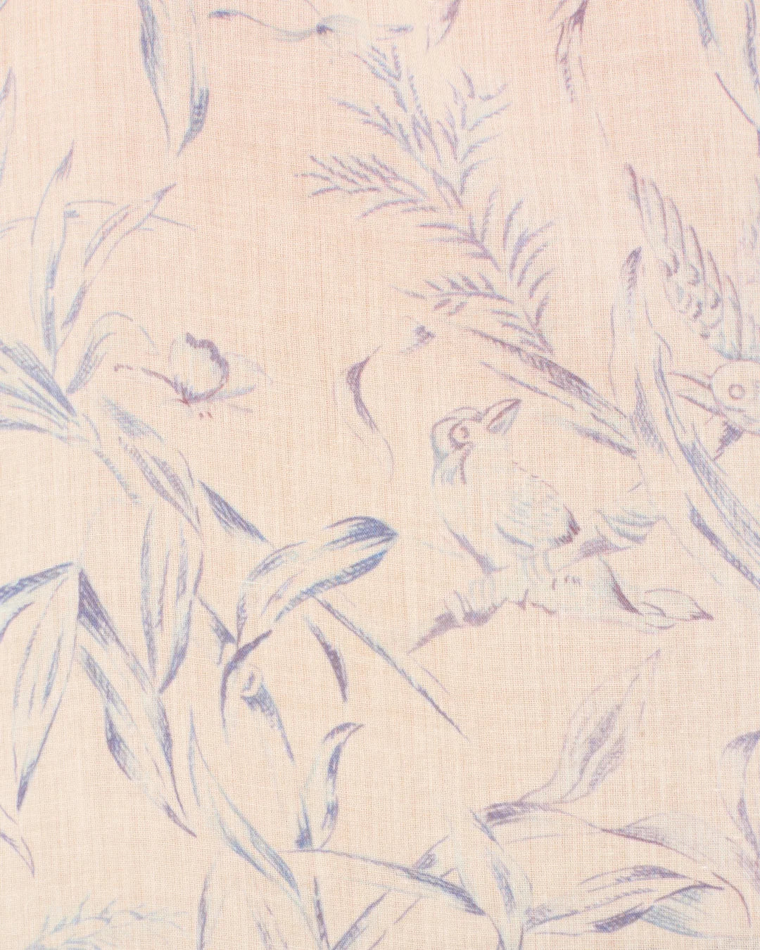 a sheer, long-sleeve button-up blouse by Alix Of Bohemia with a delicate blue and beige floral pattern